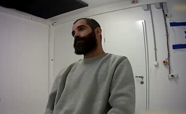 עמאד אמהז בחקירה , צילום דובר צה"ל